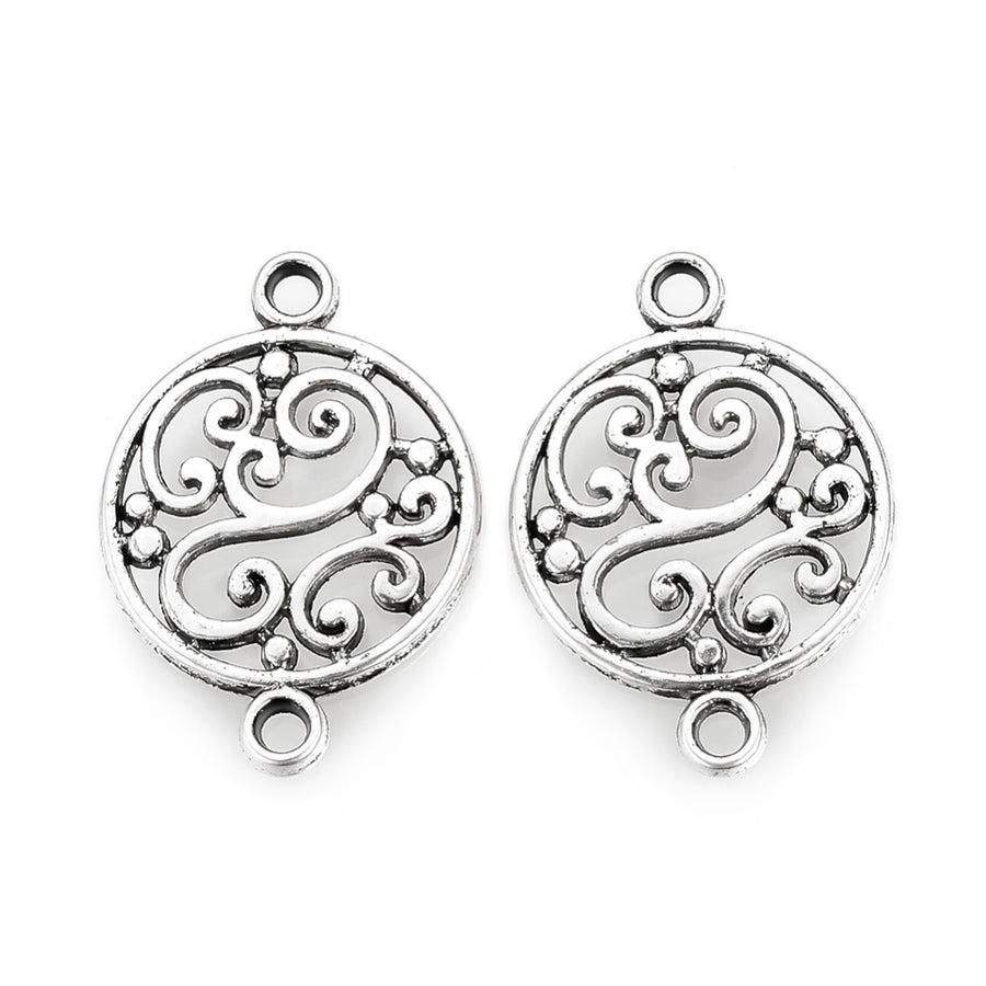 Tibetan Link Connectors, Flat, Round Shape with Design. Antique Silver Colored Connector for DIY Jewelry Making.   Size: 19mm Length, 14mm Width, 2mm Thick, Hole: 1.5mm, Quantity: 5pcs/bag.  Material: Alloy (Lead and Cadmium Free) Connectors, Links. Flat, Round Shaped. Antique Silver Color. Shinny Finish.