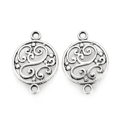 Tibetan Link Connectors, Flat, Round Shape with Design. Antique Silver Colored Connector for DIY Jewelry Making.   Size: 19mm Length, 14mm Width, 2mm Thick, Hole: 1.5mm, Quantity: 5pcs/bag.  Material: Alloy (Lead and Cadmium Free) Connectors, Links. Flat, Round Shaped. Antique Silver Color. Shinny Finish.