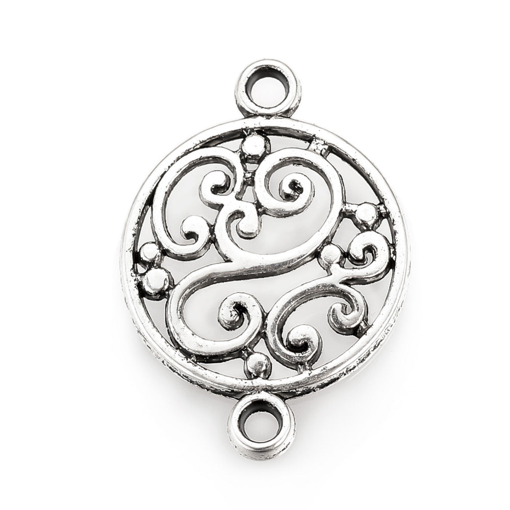 Tibetan Link Connectors, Flat, Round Shape with Design. Antique Silver Colored Connector for DIY Jewelry Making.   Size: 19mm Length, 14mm Width, 2mm Thick, Hole: 1.5mm, Quantity: 5pcs/bag.  Material: Alloy (Lead and Cadmium Free) Connectors, Links. Flat, Round Shaped. Antique Silver Color. Shinny Finish.