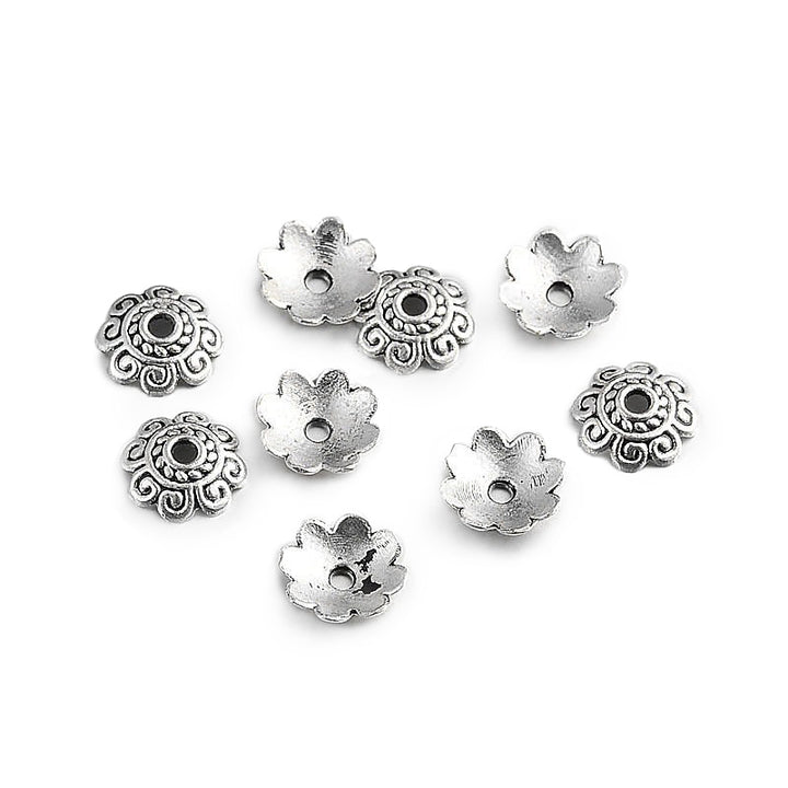 Antique Silver Bead Caps, Alloy Flower Spacer Beads. Flower Shaped Bead Caps, Antique Silver Color. Flower Spacers for DIY Jewelry Making Projects.   Size: 8mm Diameter, 2mm Thick, Hole: 1mm, approx. 50pcs/package  Material: Alloy Flower Bead Caps. Antique Silver Color.