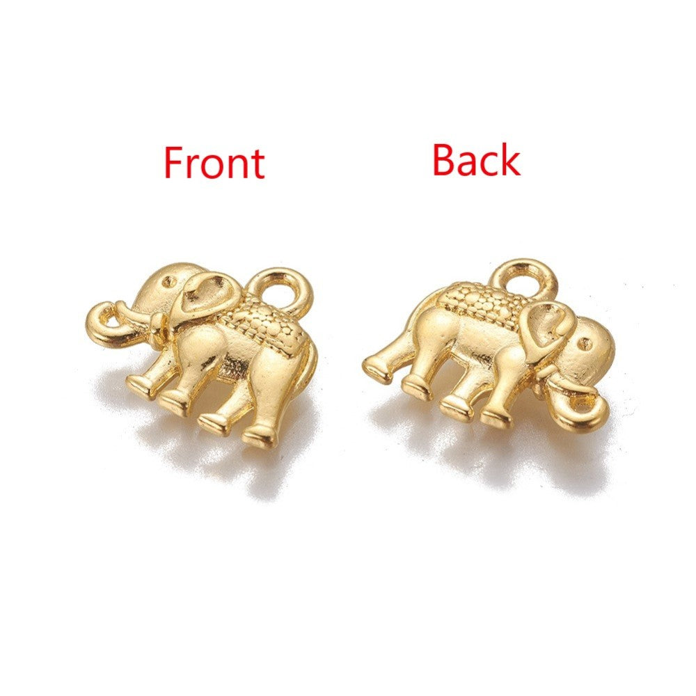 Popular Tibetan Gold Elephant Charm Beads, Antique Gold Colored Vintage Elephant Charms for DIY Jewelry Making. Charms for Bracelet and Necklace Making.  Size: 12mm Length, 14mm Width, 2.5mm Thick, Hole: 1mm, Quantity: 10 pcs/package. www.beadlot.com