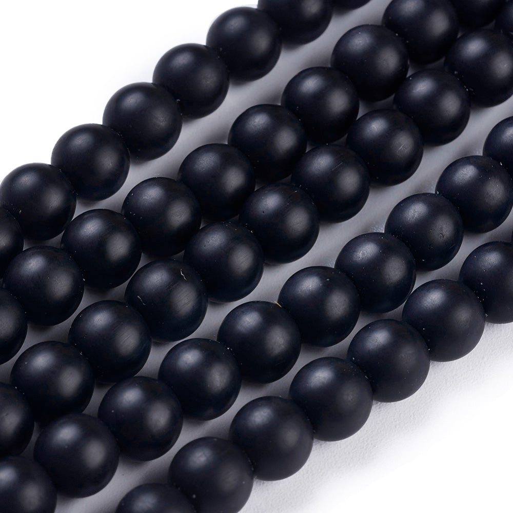 Frosted Black Stone Beads, Round, Matte Black Color. Affordable Stone beads.  Size: 6mm Diameter, Hole: 1mm; approx. 62pcs/strand, 15" Inches Long.  Material: Frosted Synthetic Black Stone Beads. Black Color. Unpolished, Matte Finish.   Wide Usage: Semi-Precious Black stone Beads are Excellent for Beading, Jewelry Making Supplies, Jewelry Design, DIY Gifts, Hand Crafts, Necklace and Bracelet Making. 