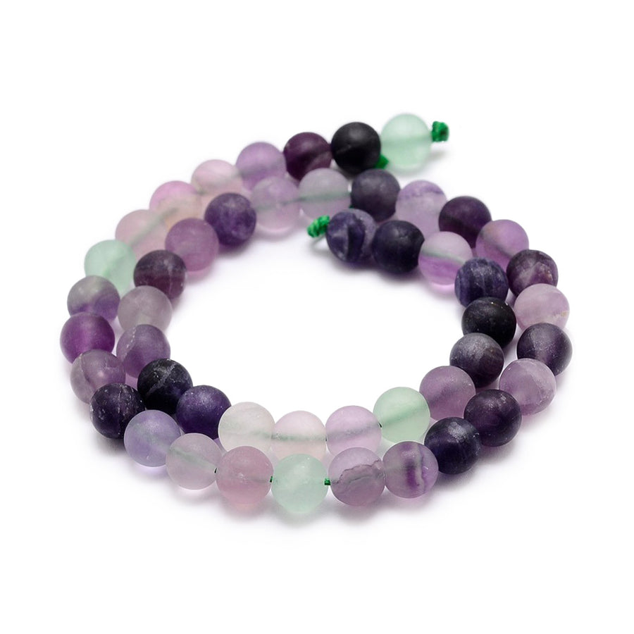 Frosted Natural Fluorite Beads, Round, Matte Fluorite Gemstone Beads for DIY Jewelry Making. Semi-precious Fluorite Beads Contain Various Shades of Matte Green and some Matte Purple Beads.   Size: 8mm Diameter, Hole: 1mm; approx. 58-61pcs/strand, 15" inches long.   Material: Frosted Natural Fluorite Stone Beads, Matte, Unpolished Finish. 