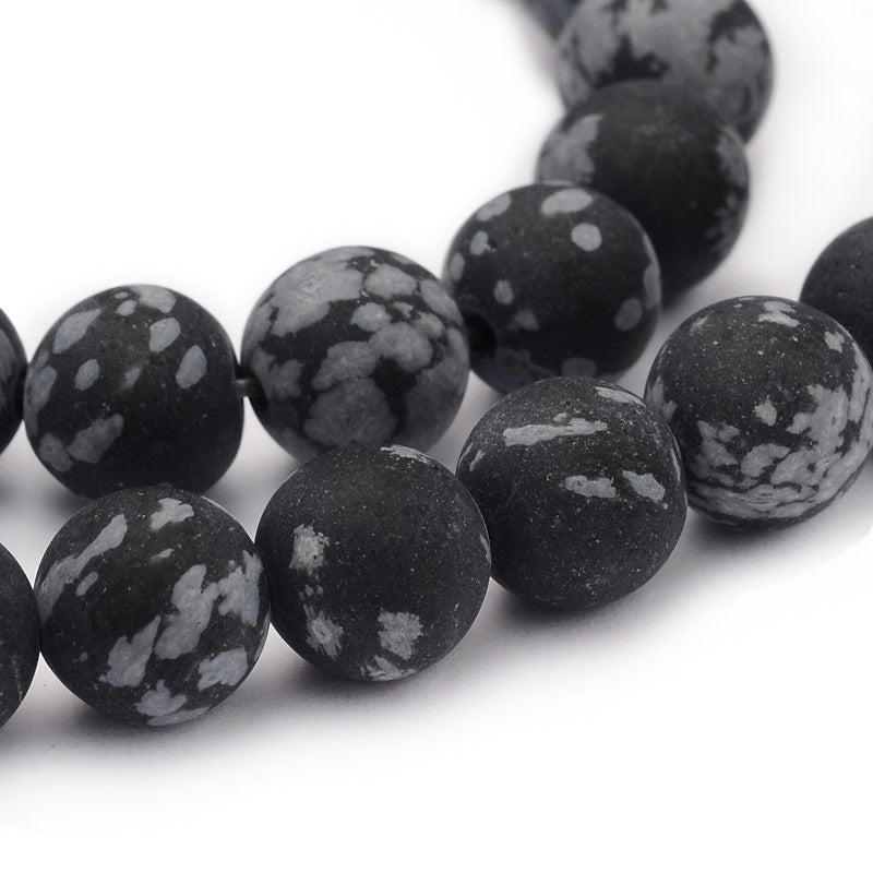 Frosted Natural Snowflake Obsidian Beads, Black Color. Matte Semi-precious Gemstone Beads for DIY Jewelry Making.   Size: 8mm Diameter, Hole: 1mm approx. 48pcs/strand, 15 Inches Long.  Material: Genuine Frosted Snowflake Obsidian Stone Beads, Black Color. Unpolished Matte Finish. 