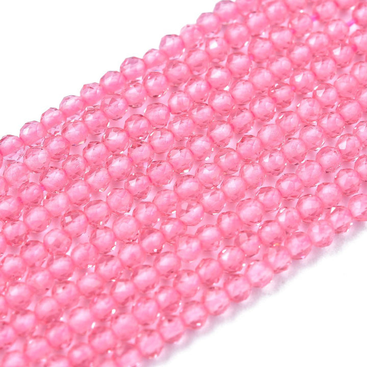 Faceted Round Glass Beads, Pearl Pink Color Glass Beads for Jewelry Making.  Size: 2mm Diameter, Hole: 0.5mm; approx. 175pcs/strand, 14" inches long.  Material: Faceted Glass Beads; Round, Pink Color Quartz Imitation Beads. Shinny Finish.