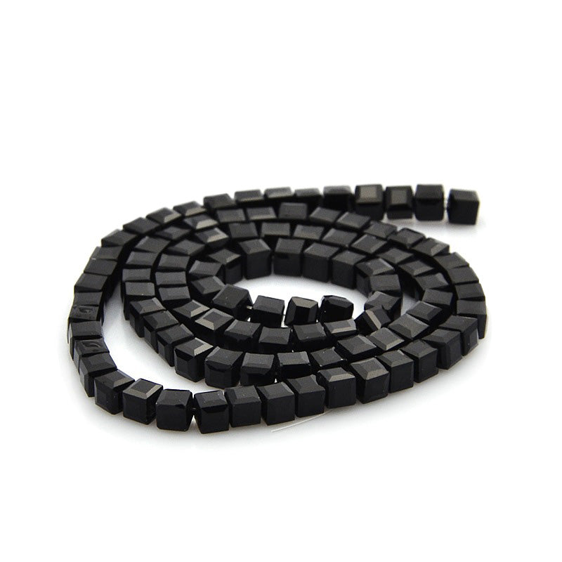 Shinny Black, Faceted, Glass Crystal Beads, Cube.  Size: 4mm Width, 4mm Length, 4mm Thick, Hole: 1mm, approx. 98pcs/strand, 15 inches long.  Material: Glass; Cube Shape. Shinny, Black Color Beads.  Shape: Cube, Faceted.  Color: Black  Usage: Beads for DIY Jewelry Making.