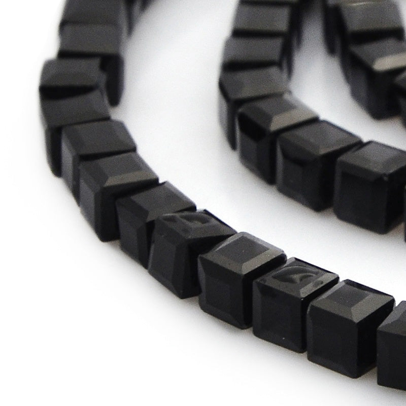Shinny Black, Faceted, Glass Crystal Beads, Cube.  Size: 4mm Width, 4mm Length, 4mm Thick, Hole: 1mm, approx. 98pcs/strand, 15 inches long.  Material: Glass; Cube Shape. Shinny, Black Color Beads.  Shape: Cube, Faceted.  Color: Black  Usage: Beads for DIY Jewelry Making.