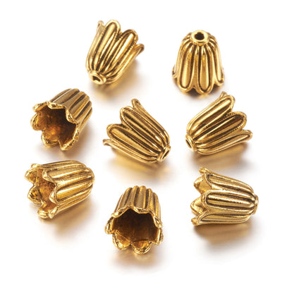 Cute Tulip Shaped Tibetan Bead Caps, Antique Gold Colored Flower Shaped Bead Caps for DIY Jewelry Making. Add the perfect Finishing Touch to Your Jewelry Designs.  Size: 10mm Diameter, 10mm Long, Hole: 1mm, Quantity: 4pcs/bag.