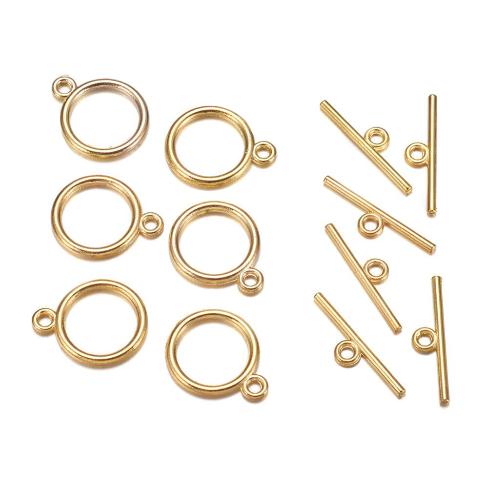 Toggle Ring Clasp for DIY Jewelry Making. Antique Gold Color, Flat, Round Clasps.  Size: Ring: 15mm, 2mm Thick, Bar: 21mm, Hole: 2mm, 5 set/package.  Material: Alloy Toggle Clasps, Cadmium, Nickel and Lead Free, Antique Gold Color Clasp. 