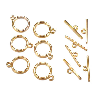 Toggle Ring Clasp for DIY Jewelry Making. Antique Gold Color, Flat, Round Clasps.  Size: Ring: 15mm, 2mm Thick, Bar: 21mm, Hole: 2mm, 5 set/package.  Material: Alloy Toggle Clasps, Cadmium, Nickel and Lead Free, Antique Gold Color Clasp. 