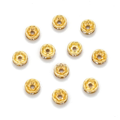 Crystal Rondelle Rhinestone Spacer Beads, Round, Gold Color, Shinny Gold Spacer Charm Beads for DIY Jewelry Making. Add Some Shine and Sparkle to Your Creations. Size: 8mm Diameter, 2.5mm Thick, Hole Size: 2mm, approx. 50pcs/bag. Material: Gold Plated Crystal Rondelle Spacer Beads. Each Spacer Bead Features 6 Sparkling Mini Crystals. Shinny Finish. 