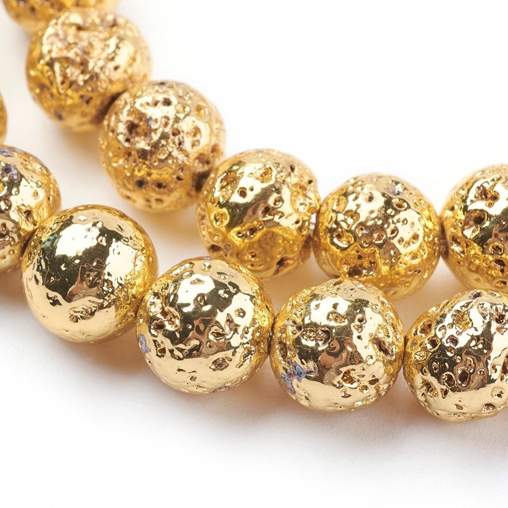 Electroplated Natural Lava Rock Bead Strands, Round, Bumpy, Gold Color. Semi-Precious Stone Beads for DIY Jewelry Making. Perfect Accent Piece for Stretch Bracelets. Size: 10-10.5mm Diameter, Hole: 1.5mm; approx. 39pcs/strand, 15.35 inches long. bead lot, beadlot, beadlotcanada. www.beadlot.com