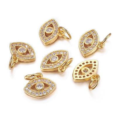 Brass Micro Pave Cubic Zirconia Golden Evil Eye Charm Beads, Gold Evil Eye Charm with Clear Cubic Zirconia for DIY Jewelry Making.  Size: 11mm Length, 9mm Width, 2mm Thick, Jump Ring: 5x0.8mm, Qty: 1pcs/package.  Material: Clear Cubic Zirconia Brass Micro Pave Evil Eye Charm with Jump Ring. Gold Color. Shinny, Sparkle Finish. Durable. Polished, Shinny Finish. The perfect choice for Jewelry Making.