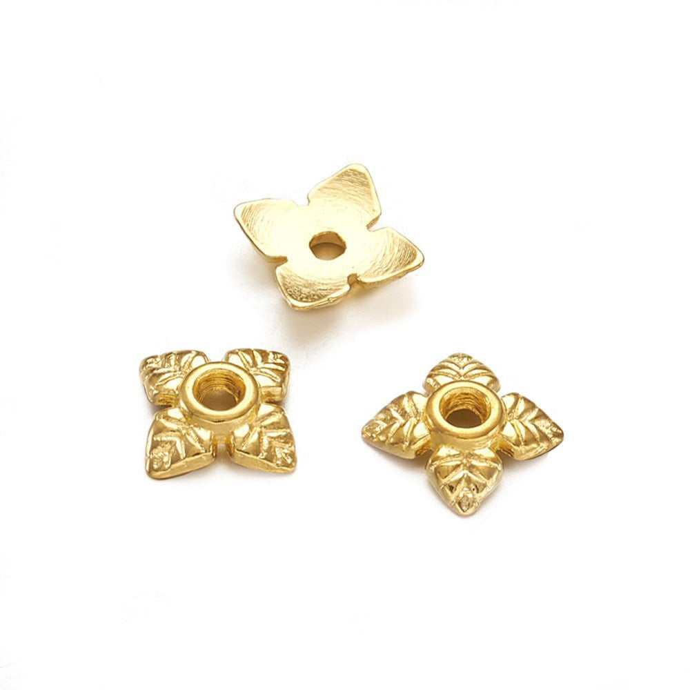 Alloy Flower Spacer Beads. Flower Shaped Bead Caps, Gold Color. Flower Spacers for DIY Jewelry Making Projects.   Size: 6mm Diameter, 2mm Thick, Hole: 1mm, approx. 20pcs/package.  Material: Alloy Flower Bead Caps. Shinny Antique Gold Color. Lead and Nickel Free.