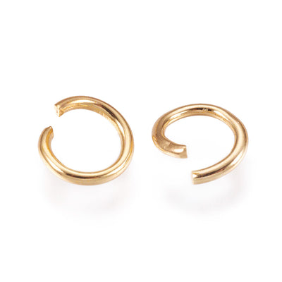 304 Stainless Steel Jump Rings, Open Jump Rings, Gold Color. Great for DIY Jewelry Making, Keychain and Accessory Crafting.  Size: 21 Gauge, 0.7mm Thick, 5mm Diameter, approx. 200pcs/package.  Material :304 Stainless Steel Open Jump Rings, 21 Gauge. Gold Color Metal Connectors.