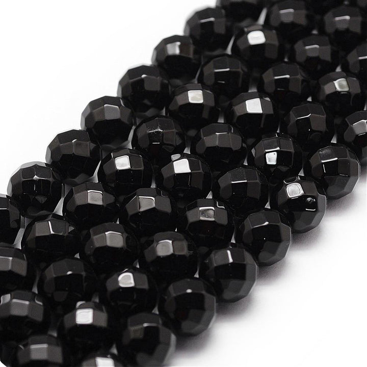 Faceted, Round Black Onyx Beads. Semi-Precious Gemstone Beads for DIY Jewelry Making.   Size: 8mm Diameter, Hole: 1mm; approx. 42-44pcs/strand, 14.5" Inches Long.  Material: Grade "A" Faceted Black Onyx, Black Color. Polished, Shinny Finish.