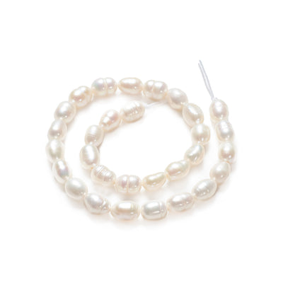 Grade A Cultured Freshwater Pearl Beads, Rice Shape, White Color. Natural Pearls for DIY Jewelry.  Material: Grade "A" Cultured Fresh water Pearls, Rice, White Color.  Size: 5.5-7mm Length, 4-5mm Diameter, Hole: 0.8mm, approx. 26 pcs/strand, 7 inch/strand.