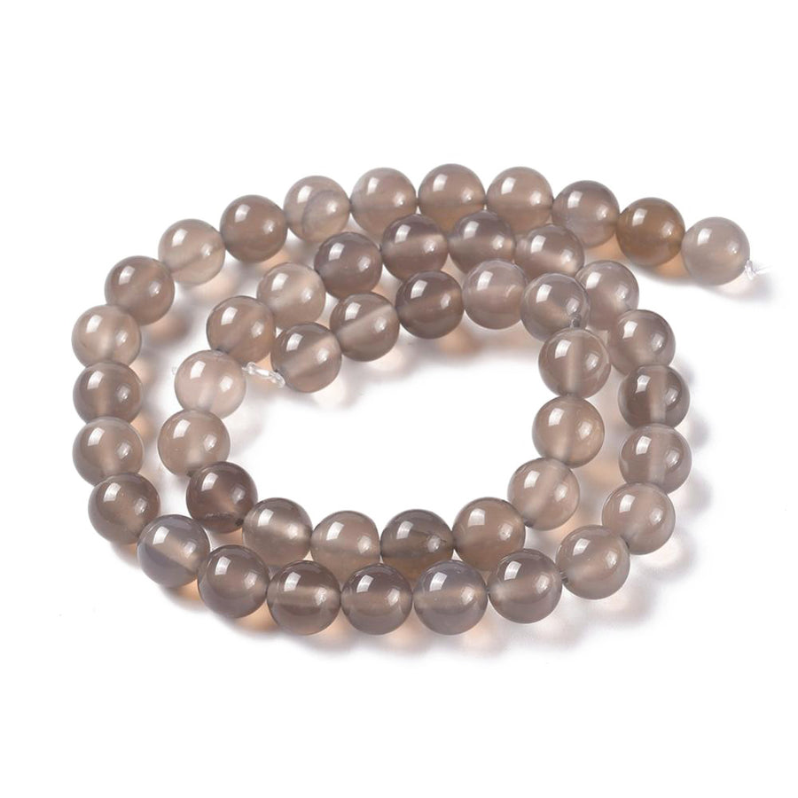 Premium Quality Gray Agate Beads, Round, Grey Color. Semi-Precious Gemstone Beads for Jewelry Making. Great for Stretch Bracelets and Necklaces.  Size: 8mm Diameter, Hole: 1mm; approx. 46pcs/strand, 15" Inches Long.  Material: Grade "A" Premium Quality Gray Agate Loose Stone Beads, Grey Color, Polished, Shinny Finish.