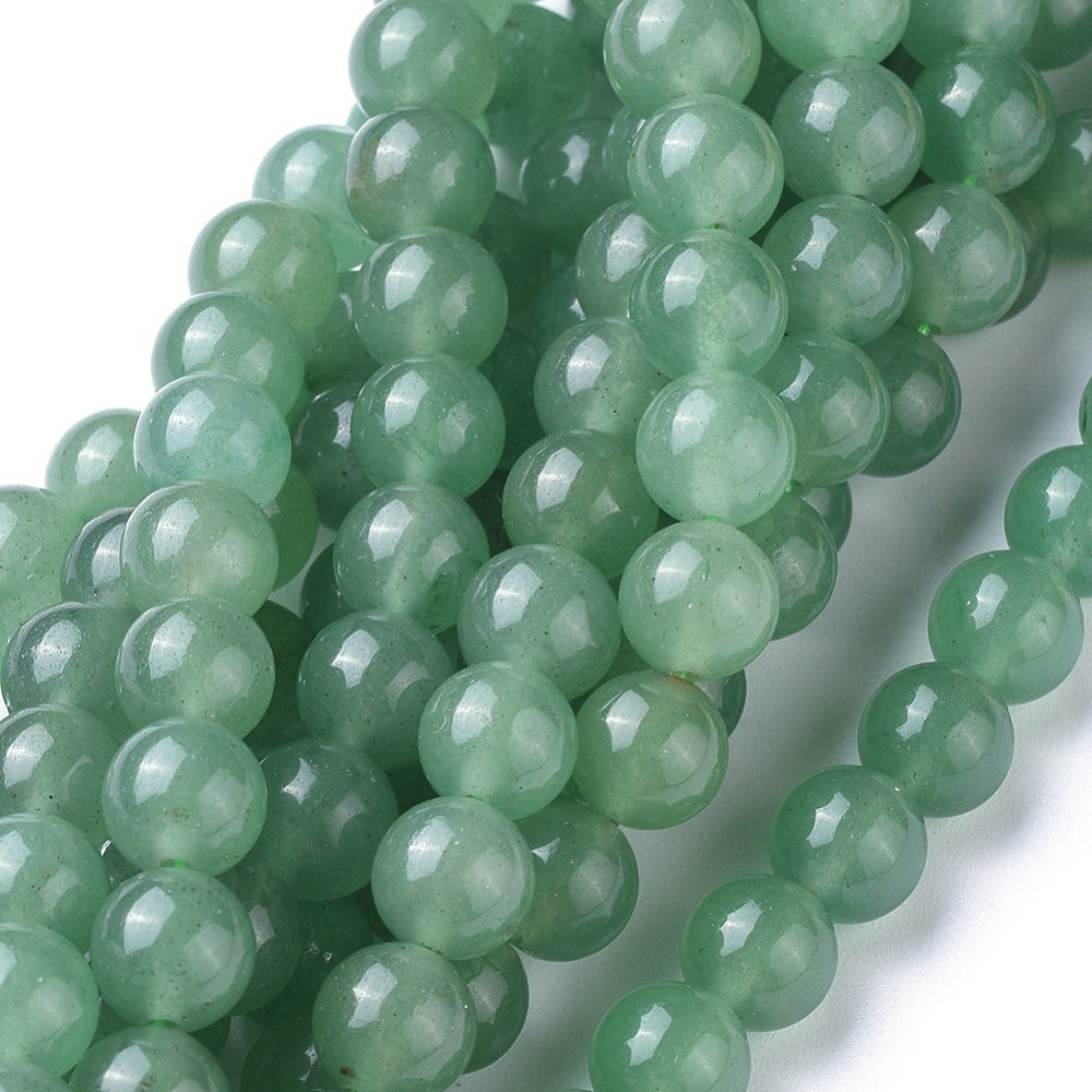 Natural Green Aventurine Beads, Green Color. High Quality Semi-Precious Gemstone Beads for DIY Jewelry Making.   Size: 6mm Diameter, Hole: 0.8mm, approx. 60-63 pcs/strand 15" Inches Long.   Material: Genuine Natural Green Aventurine Stone Loose Beads, Green Color.  Polished Finish.   Green Aventurine Properties:  Green Aventurine Stone provides Courage, Confidence, Happiness and Strength. It's Believed to Increase Optimism and the Will Power to Take Action. 