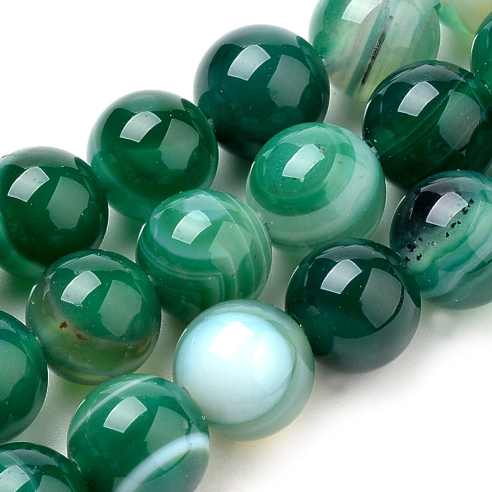 Green Striped Agate Beads, Round, Dyed, Green Banded Agate. Semi-Precious Gemstone Beads for Jewelry Making. Great for Stretch Bracelets and Necklaces.  Size: 8mm Diameter, Hole: 1mm; approx. 47pcs/strand, 14.5" Inches Long.  Material: Striped Banded Agate Loose Beads Dyed Green Color. Polished, Shinny Finish.