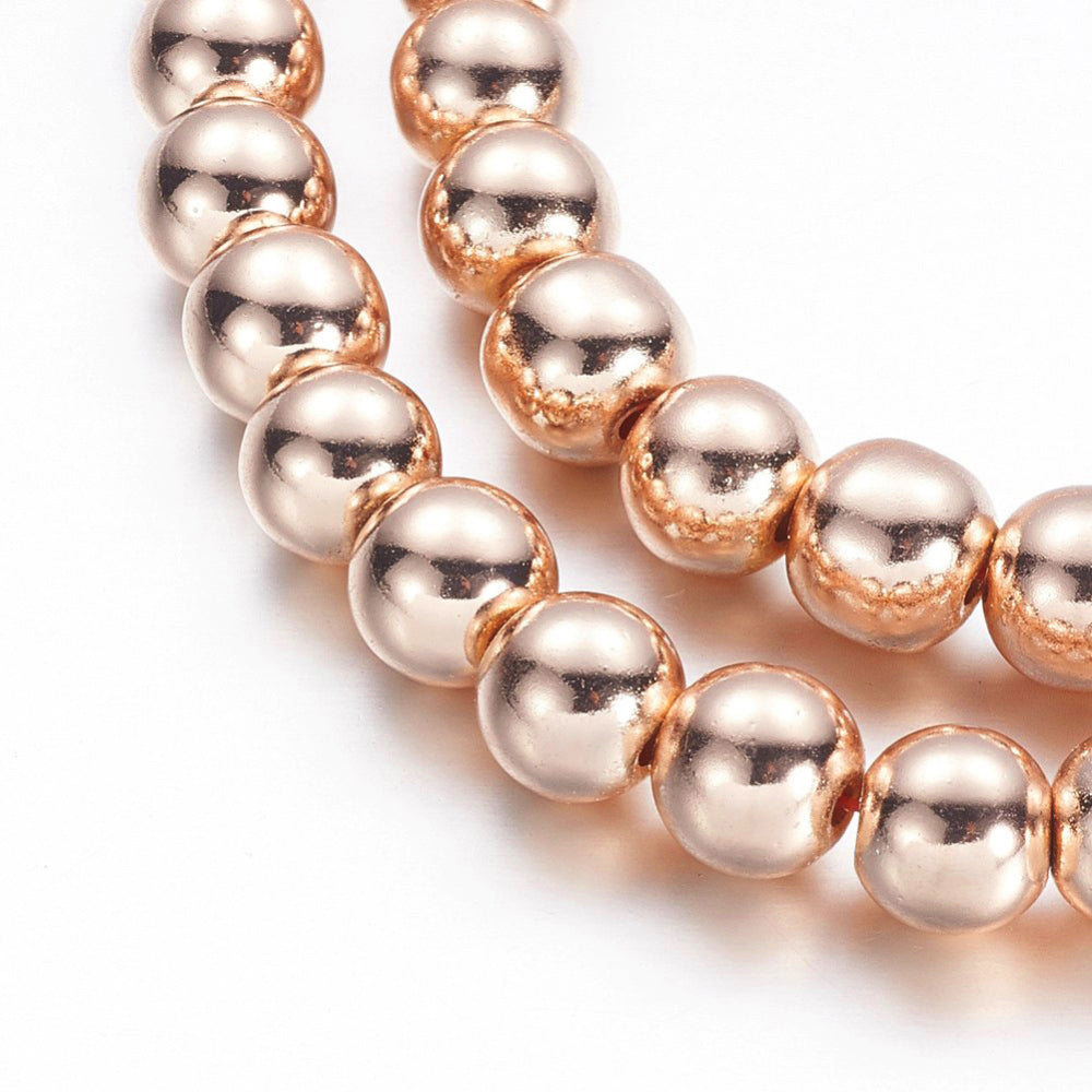 Rose Gold Hematite Spacer Beads, Electroplated Non-magnetic Synthetic Hematite Bead Strands, Round, Rose Gold Plated. Rose Gold Spacers for Jewelry Making.  Size: 6mm in diameter, hole: 1-1.5mm; approx. 67-70pcs/strand, 15.7 inches.