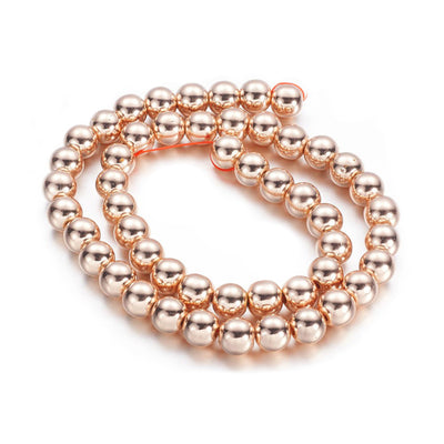 Electroplated Non-Magnetic Hematite Beads, Metallic Rose Gold Color. Semi-Precious Stone Beads for Jewelry Making. Affordable High Quality Beads for Mala Bracelets.  Size: 8mm Diameter, Hole: 1mm, approx. 50pcs/strand, 15.5" Inches Long.  Material: Premium Quality Non-Magnetic Hematite Bead Strands. Metallic Rose Gold Color. Polished, Shinny Metallic Lustrous Finish. bead lot. beadlot. beadlotcanada