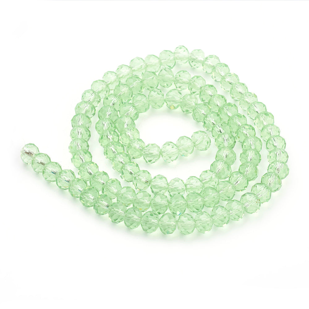 Handmade Glass Beads, Faceted, Light Green Color, Rondelle, Glass Crystal Bead Strands. Shinny, Premium Quality Crystal Beads for Jewelry Making.  Size: 8mm Diameter, 6mm Thick, Hole: 1mm; approx. 65pcs/strand, 16" inches long.  Material: The Beads are Made from Glass. Glass Crystal Beads, Rondelle, Light Green Color Beads. Polished, Shinny Finish.