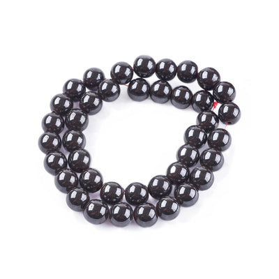Magnetic Hematite Bead Strands, Round, Metallic Gunmetal Black Color. Semi-Precious Beads for Jewelry Making. Affordable High Quality Beads for Jewelry Making.  Size: 8mm Diameter, Hole: 2mm, approx. 48pcs/strand, 15 Inches Long.  Material: Grade A, Magnetic Hematite Bead Strands. Metallic Black/Grey Colored Glass Beads. Polished, Shinny Metallic Lustrous Finish. bead lot