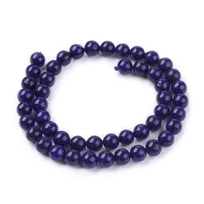 Dark Lapis Lazuli Beads, Round, Dyed, Dark Blue Color. Semi-precious Lapis Lazuli Gemstone Beads for DIY Jewelry Making.    Size: 8mm Diameter, Hole: 1mm, approx. 45pcs/strand, 15" inches long.  Material: Grade B Natural Dark Blue Lapis Lazuli Stone Beads. Dyed Dark Blue Color. Shinny, Polished Finish.