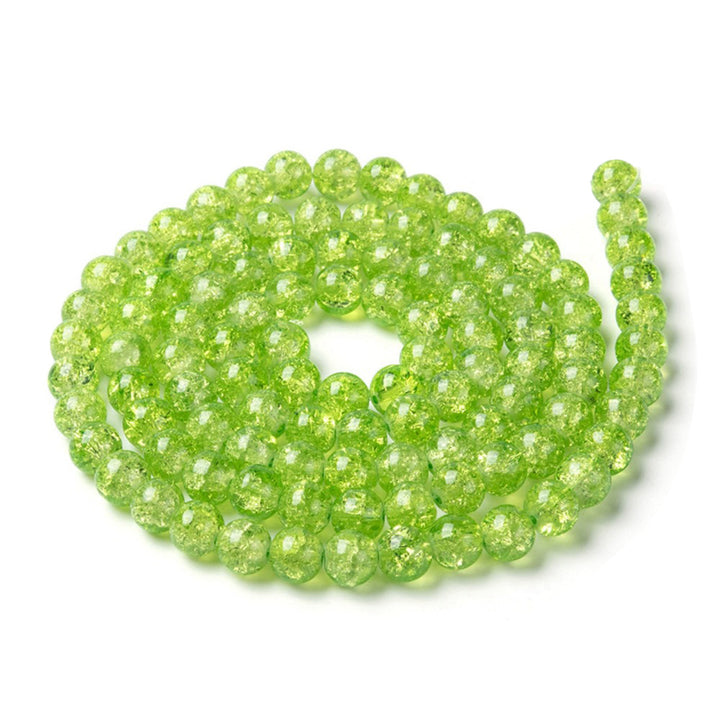 Popular Crackle Glass Beads, Round, Light Green Color. Glass Bead Strands for DIY Jewelry Making. Affordable, Colorful Crackle Beads.   Size: 6mm Diameter Hole: 1mm; approx. 125pcs/strand, 31" Inches Long  Material: The Beads are Made from Glass. Crackle Glass Beads, Light Lime Green Colored Beads. Polished, Shinny Finish.