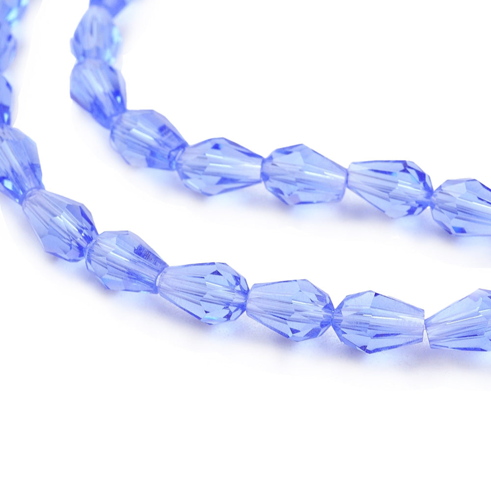 Teardrop Crystal Glass Beads, Faceted, Pale Royal Blue Color, Glass Crystal Bead Strands. Shinny Crystal Beads for Jewelry Making.  Size: 7mm Length, 5mm Thick, Hole: 1.5mm; approx. 68pcs/strand, 16" inches long.  Material: The Beads are Made from Glass. Glass Crystal Beads, Teardrop Shaped, Light Pale Royal Blue Colored Austrian Crystal Imitation Beads. Polished, Shinny Finish.
