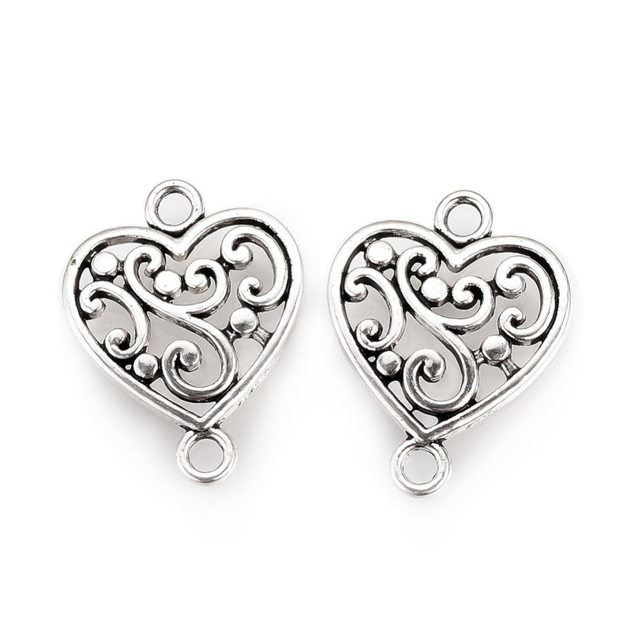 Tibetan Link Connectors, Heart. Antique Silver Colored Connector for DIY Jewelry Making.   Size: 19mm Length, 14mm Width, 2mm Thick, Hole: 2mm, Quantity: 3pcs/bag  Material: Alloy (Lead and Cadmium Free) Connectors, Links. Heart Shaped. Antique Silver Color. Shinny Finish.