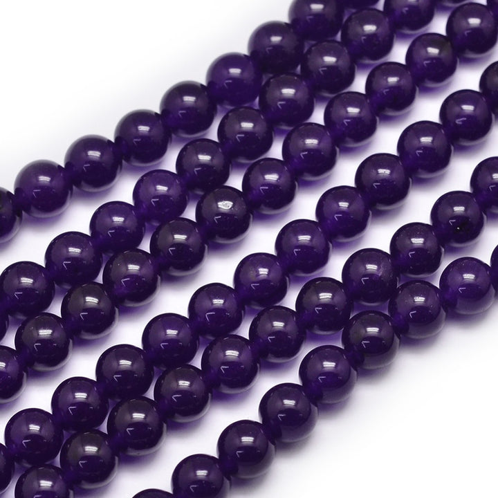 Mauve Jade Beads, Round, Purple Color. Semi-Precious Gemstone Beads for Jewelry Making.  Size: 8mm Diameter, Hole: 1mm; approx. 47pcs/strand, 15" inches long.  Material: Malaysia Jade, Dyed Indigo Purple. Polished, Shinny Finish.