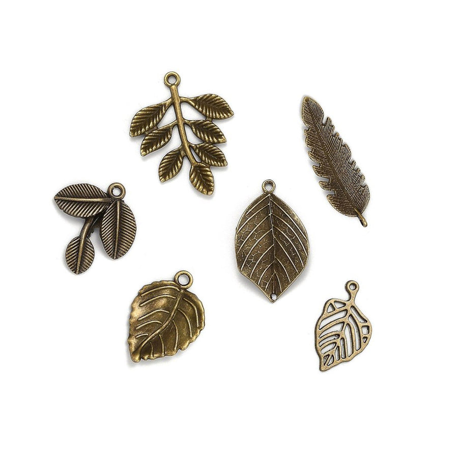 Random Assortment of Leaf Charms in various sizes., Antique Bronze Colored Leaf Charms for Jewelry Making. Mixed Assortment of Leaf Pendants.  Size: Mixed Shapes and Sizes, Hole: 1mm, Quantity: 25 pcs/bag.  Material: Alloy (Lead, Cadmium and Nickel Free) Charms. Antique Bronze Color. 