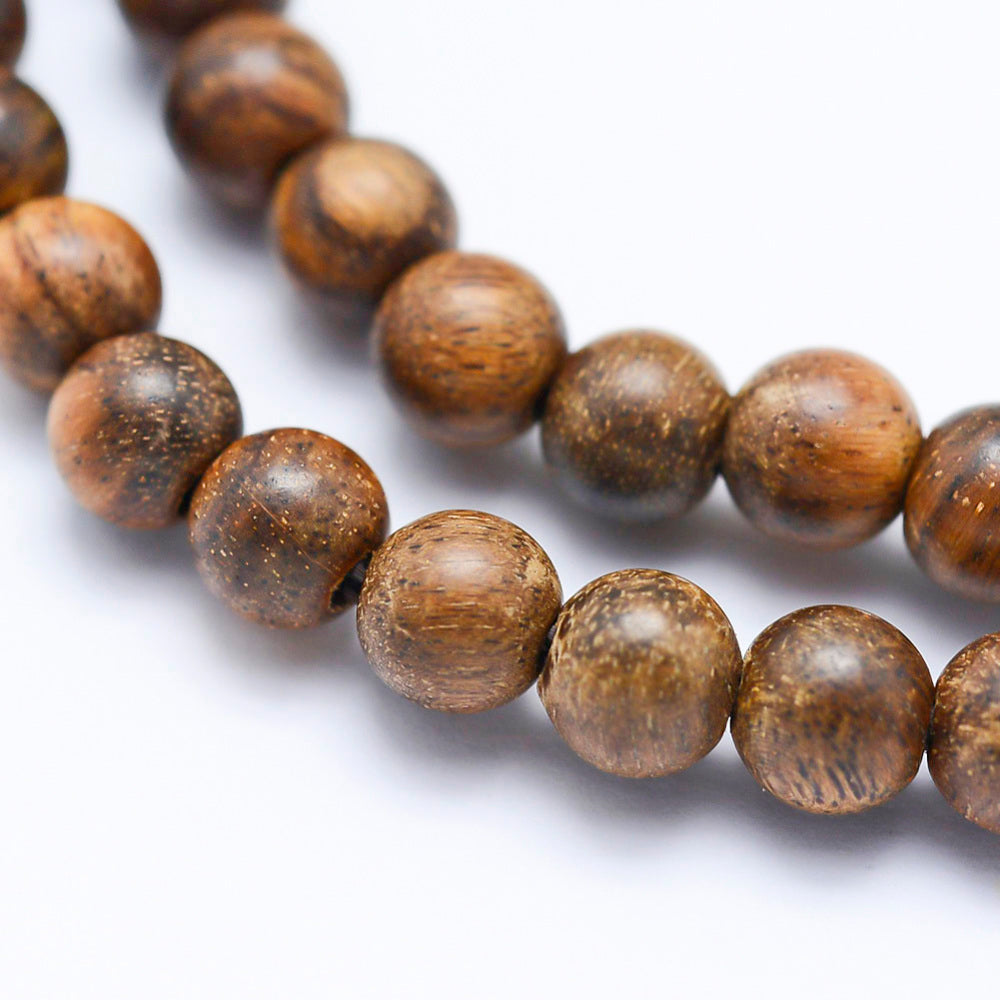 Natural African Padauk Wood Beads Strands, Undyed, Round Wooden Beads for DIY Jewelry Making. Premium Quality Wooden Beads at Affordable Prices.  Size: 6mm in diameter, hole: 1mm; about 64pcs/strand, 15.7''inches. bead lot