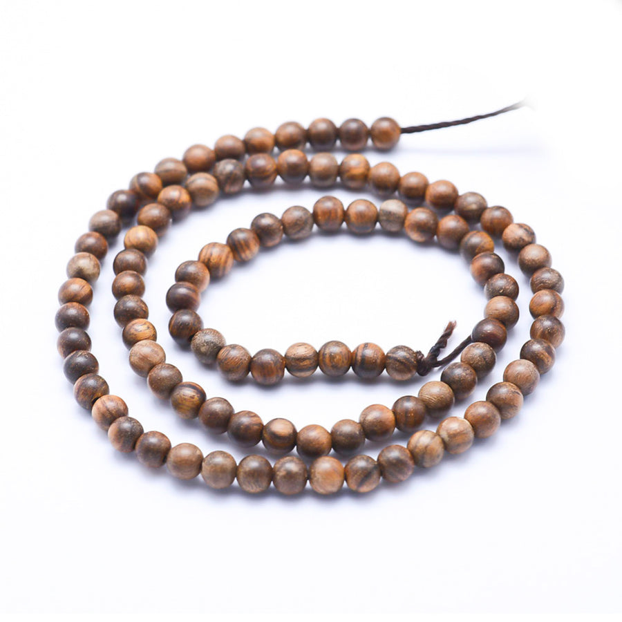 Natural African Padauk Wood Beads Strands, Undyed, Round Wooden Beads for DIY Jewelry Making. Premium Quality Wooden Beads at Affordable Prices.  Size: 6mm in diameter, hole: 1mm; about 64pcs/strand, 15.7''inches. beadlot