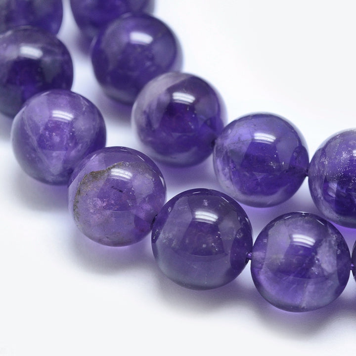 Natural Amethyst Crystal Beads, Round, Purple Color. Semi-Precious Gemstone Beads for DIY Jewelry Making. Gorgeous, High Quality Crystal Beads.  Size: 10mm Diameter, Hole: 1mm; approx. 40pcs/strand, 15" Inches Long.