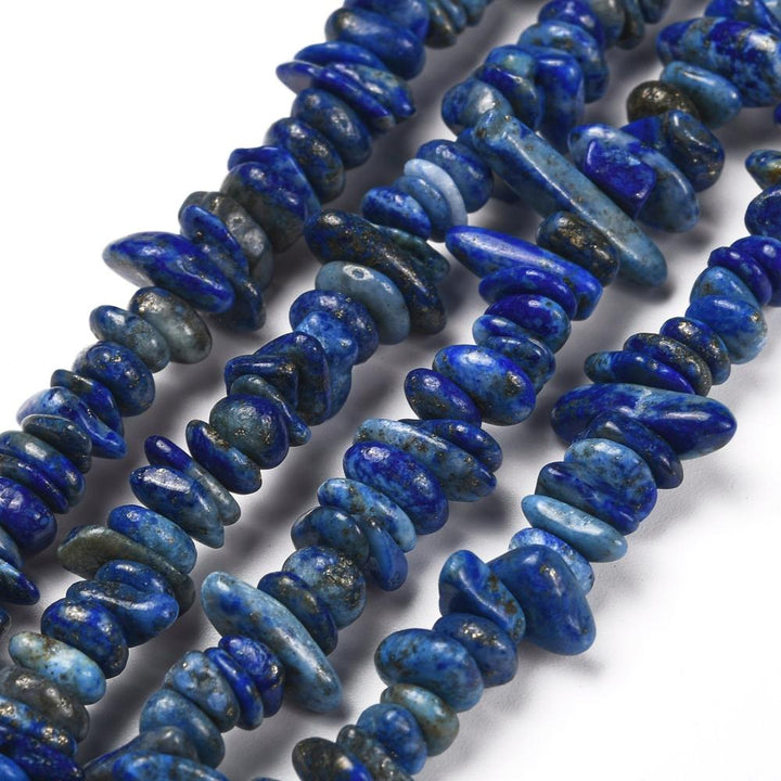 Natural Lapis Lazuli Chip Bead Strands, Round, Dyed, Chips, Intense Deep Blue Color. Semi-precious Lapis Lazuli Gemstone Chip Beads for DIY Jewelry Making.   Size: 5~8x5~8mm chips, Hole: 1mm; approx. 31.5 inches.