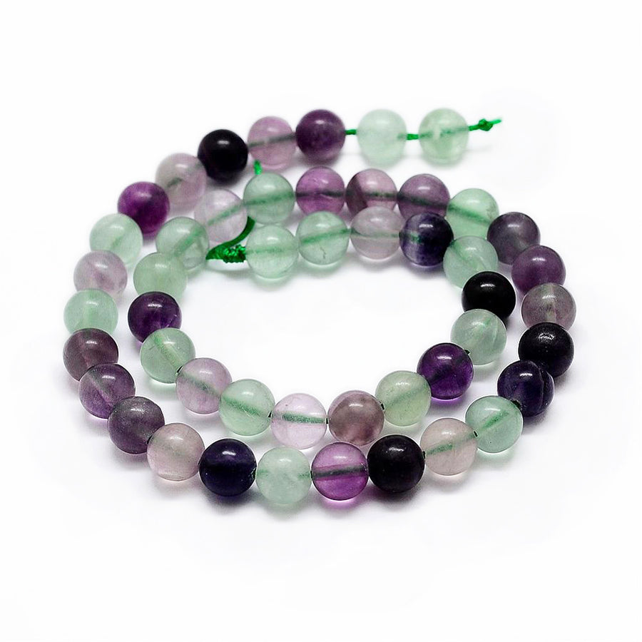 Natural Rainbow Fluorite Bead Strands, Round, Fluorite Gemstone Beads for DIY Jewelry Making. Semi-precious Fluorite Bead Strands Contain Various Shades of Green and some Purple Beads with Specs of White. The Primary Color of the Beads is a Light Green.  Size: 10mm in diameter, hole: 1mm; approx. 37-38pcs/strand, 15 inches long.   Material: Genuine Natural Rainbow Fluorite Stone Beads. Polished Finish. 
