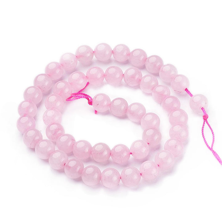 Natural Rose Quartz Beads Strands, Round. Pink Quartz Beads. Semi-precious Gemstone Beads for DIY Jewelry Making. Soft Pink, Rose Quartz Beads. Pink Quartz Crystal Beads. Size: 6mm in diameter, Hole: 0.8mm; approx. 65pcs/strand, 15" inches long.