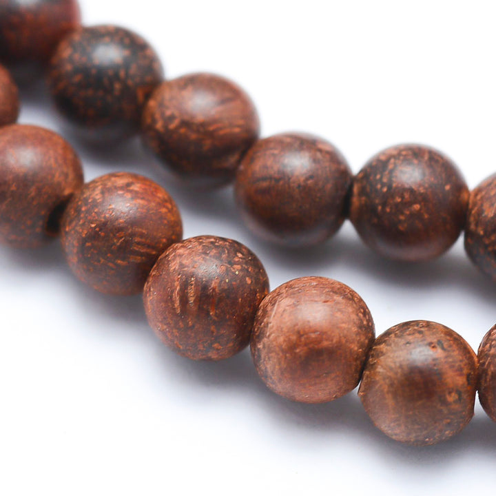 Natural Rosewood Beads Strands, Round, Dyed Wooden Bead Strands for DIY Jewelry Making. Premium Quality Wood Beads.   Size: about 6mm in diameter, hole: 1mm; about 64pcs/strand, 15.7"