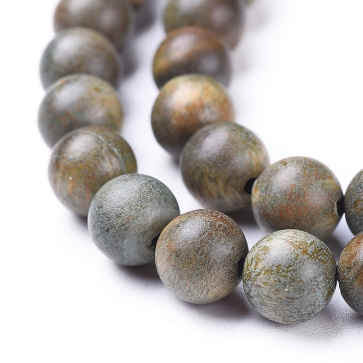 Natural Sandalwood Beads Strands, Round, Olive Colored Wooden Bead Strand for DIY Jewelry Making Projects.  Size: 8mm in diameter, hole: 1.2mm; about 51pcs/strand, 15.9 inches  Material: Genuine Natural Sandalwood Wooden Loose Beads. Undyed, Round Beads.