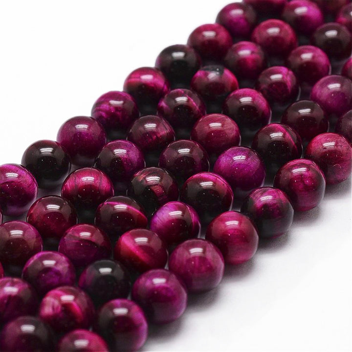 Natural Tiger Eye Beads, Round. Fuchsia Colored Beads for DIY Jewelry Making. Gorgeous Tiger Eye Gemstone Beads, Perfect for Mala Bracelets. Deep Magenta Tiger Eye Bead Strands, High Quality Semi-precious Gemstone Beads.  Size: 8mm Diameter, Hole: 1mm; approx. 44 pcs/strand 14.9" inches long.  Material: Genuine Natural Fuchsia Tiger Eye Polished Loose Stone Beads, High Quality Gemstone Beads. Dyed & Heated, Polished, Shinny Finish. 