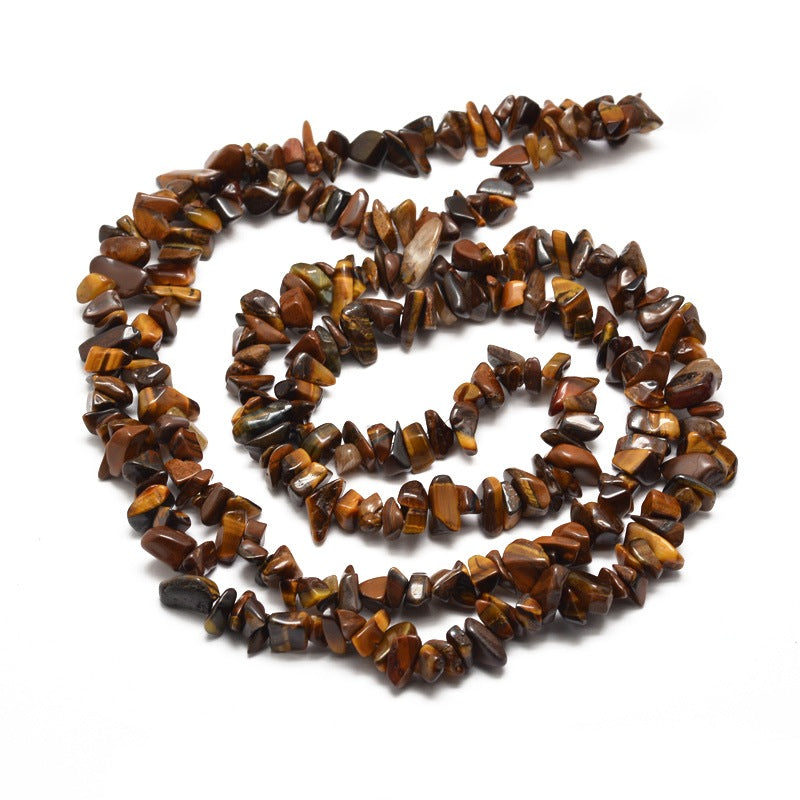 Natural Tiger Eye Chip Bead Strands. Semi-precious Gemstone Tiger Eye Chip Beads for DIY Jewelry Making.  High Quality Beads for Making Mala Bracelets. Size: about 5~8mm wide, 5~8mm long, hole: 1mm; approx. 31.5" inches. bead lot.