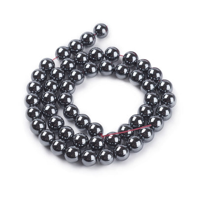 Non-Magnetic Magnetic Hematite Beads, Round, Metallic Gunmetal Color. Semi-Precious Beads for Jewelry Making. Affordable High Quality Beads for Jewelry Making.  Size: 8mm Diameter, Hole: 1mm, approx. 48-52pcs/strand, 15 Inches Long.  Material: Non-Magnetic Synthetic Hematite Bead Strands. Metallic Black/Grey Colored Glass Beads. Polished, Shinny Metallic Lustrous Finish.