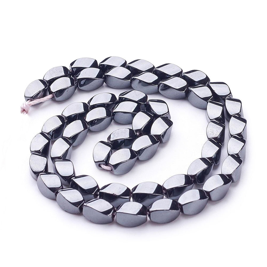 Oval Shaped Non-Magnetic Hematite Beads, Oval Twist, Metallic Gunmetal Black Color. Semi-Precious Stone Beads for Jewelry Making.  Size: 8mm Length, 5mm Width, Hole: 1mm, approx. 48pcs/strand, 15 Inches Long.  Material: Non-Magnetic Synthetic Hematite Bead Strands. Metallic Gunmetal/Black Colored Stone Beads. Polished, Shinny Metallic Lustrous Finish.