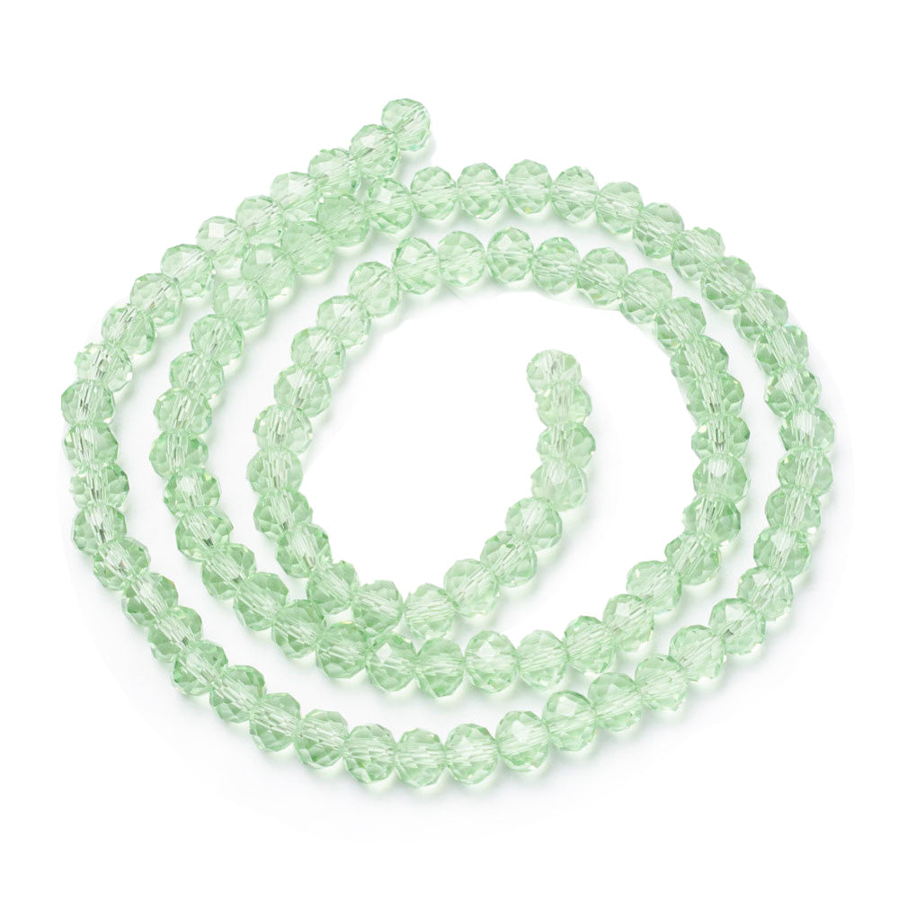 Glass Crystal Beads, Faceted, Pale Light Green Color, Rondelle, Glass Crystal Bead Strands. Shinny Crystal Beads for Jewelry Making.  Size: 8mm Diameter, 6mm Thick, Hole: 1mm; approx. 65pcs/strand, 16" inches long.  Material: The Beads are Made from Glass. Glass Crystal Beads, Rondelle, Light Green Color Austrian Crystal Imitation Beads. Polished, Shinny Finish.   