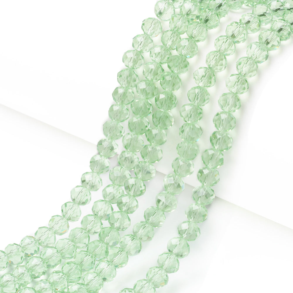 Glass Crystal Beads, Faceted, Pale Light Green Color, Rondelle, Glass Crystal Bead Strands. Shinny Crystal Beads for Jewelry Making.  Size: 8mm Diameter, 6mm Thick, Hole: 1mm; approx. 65pcs/strand, 16" inches long.  Material: The Beads are Made from Glass. Glass Crystal Beads, Rondelle, Light Green Color Austrian Crystal Imitation Beads. Polished, Shinny Finish.   