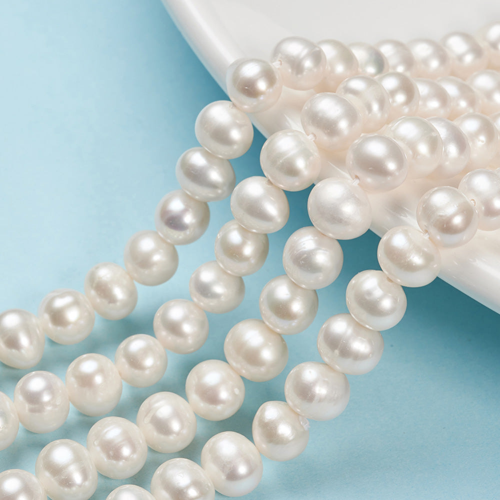 Freshwater Pearl Beads, Potato Shape, Floral White Color. Natural Pearls for DIY Jewelry.  Material: Premium Grade "A" Pearl Beads. Cultured Freshwater Pearls, Round Oval, Floral White Color.   Size: 7-8mm Diameter, Hole: 0.8mm, approx. 58pcs/strand, 15 inch/strand.