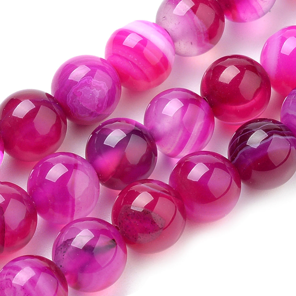 Fuchsia Striped Agate Beads, Round, Dyed, Pink Banded Agate. Semi-Precious Gemstone Beads for Jewelry Making. Great for Stretch Bracelets and Necklaces.  Size: 8mm Diameter, Hole: 1mm; approx. 47pcs/strand, 14.5" Inches Long  Material: Striped Banded Agate Loose Beads Dyed Hot Pink Color. Polished, Shinny Finish.